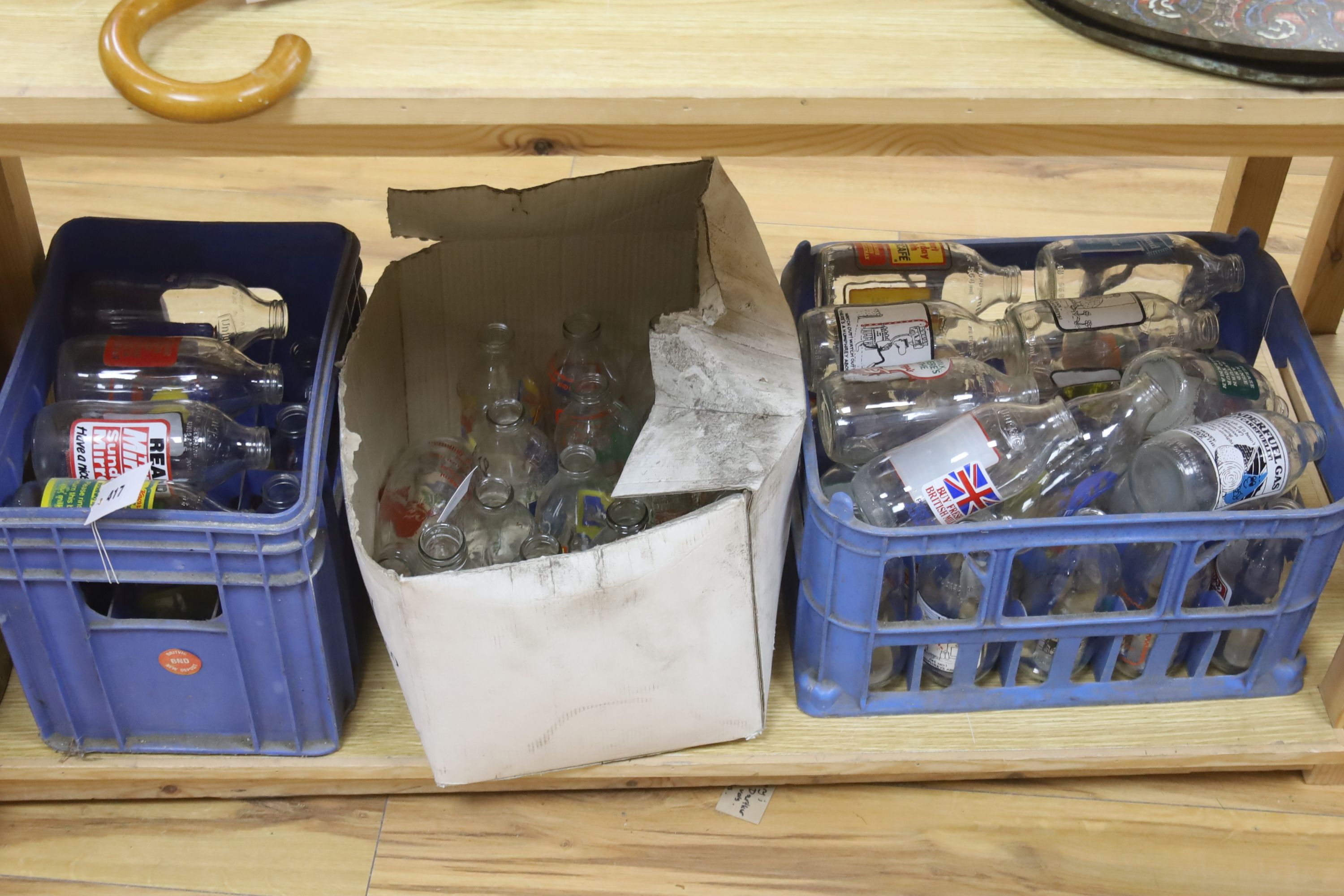 A large collection of branded milk bottles 1970s or later